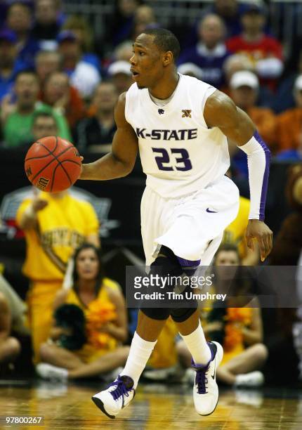 Dominique Sutton of the Kansas State Wildcats brings the ball up the court against the Baylor Bears during the semifinals of the 2010 Phillips 66 Big...