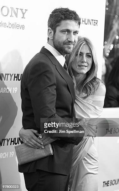 Actors Gerard Butler and Jennifer Aniston attend the premiere of "The Bounty Hunter" at the Ziegfeld Theatre on March 16, 2010 in New York City.