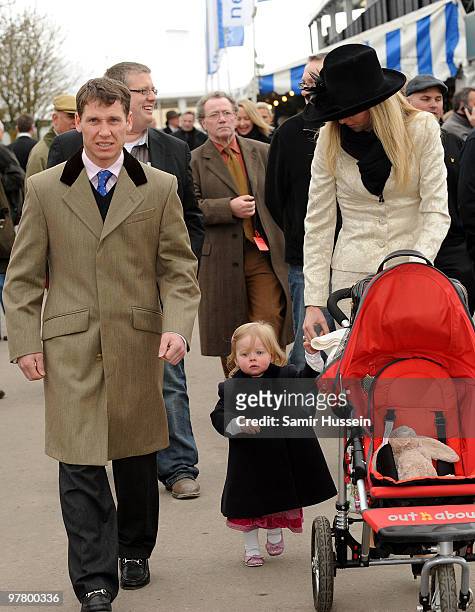Jockey Richard Johnson attends on Day 2 of the Cheltenham Festival with wife Fiona and daughter Willow on March 17, 2010 in Cheltenham, England.