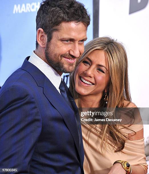 Gerard Butler and Jennifer Aniston attend the premiere of "The Bounty Hunter" at Ziegfeld Theatre on March 16, 2010 in New York, New York City.