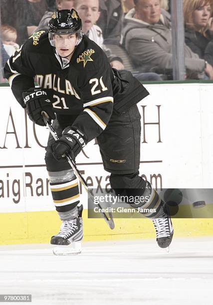 Loui Eriksson of the Dallas Stars shovels a pass off to a teammate against the San Jose Sharks on March 16, 2010 at the American Airlines Center in...