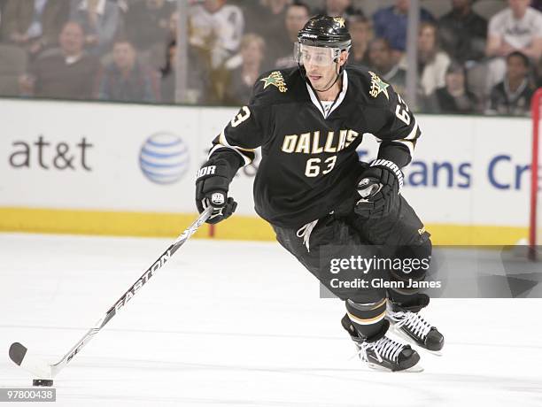 Mike Ribeiro of the Dallas Stars handles the puck against the San Jose Sharks on March 16, 2010 at the American Airlines Center in Dallas, Texas.