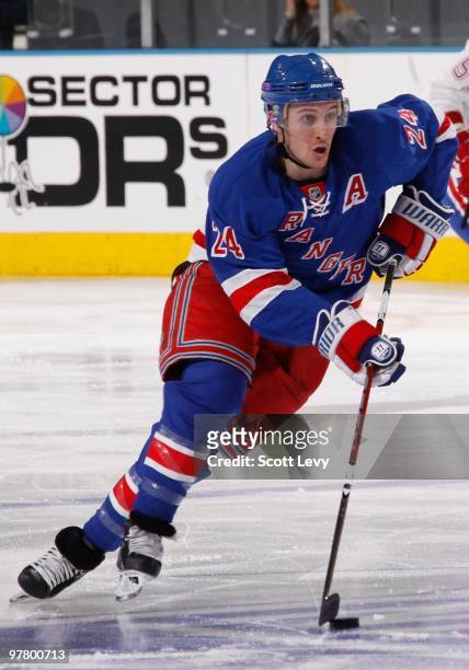 Ryan Callahan of the New York Rangers skates with the puck against the Montreal Canadiens in the second period on March 16, 2010 at Madison Square...