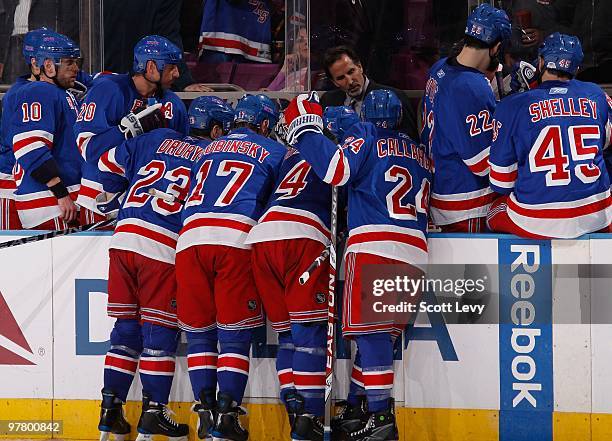 Head Coach Mike Tortorella of the New York Rangers strategies with his team during a time-out in the game against the Montreal Canadiens on March 16,...