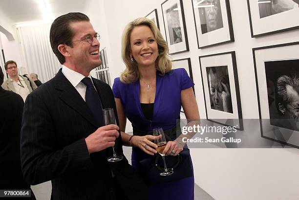 German Defense Minister Karl-Theodor zu Guttenberg and his wife Stephanie attend the "Die 8 Kanzler" exhibition opening on March 17, 2010 in Berlin,...