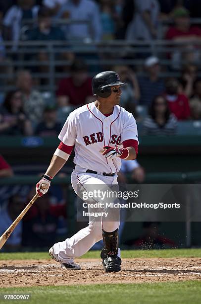 Victor Martinez of the Boston Red Sox bats against the Pittsburgh Pirates at at City of Palms Park on March 13, 2010 in Fort Myers, Florida.