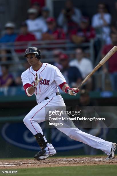 Victor Martinez of the Boston Red Sox bats against the Pittsburgh Pirates at at City of Palms Park on March 13, 2010 in Fort Myers, Florida.