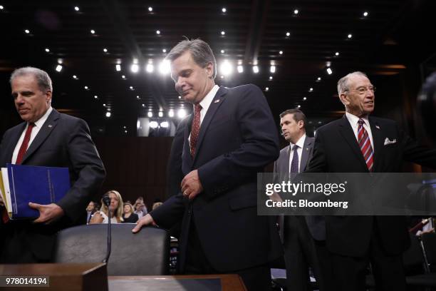 Michael Horowitz, inspector general with the U.S. Department of Justice , from left, Christopher Wray, director of the Federal Bureau of...