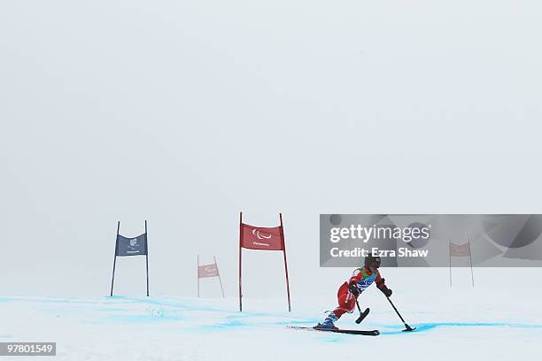 Hiraku Misawa of Japan competes in the Men's Standing Giant Slalom during Day 6 of the 2010 Vancouver Winter Paralympics at Whistler Creekside on...