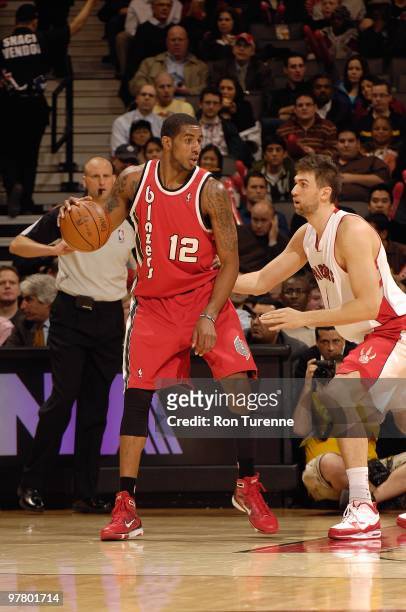 LaMarcus Aldridge of the Portland Trail Blazers handles the ball against Andrea Bargnani of the Toronto Raptors during the game on February 24, 2010...