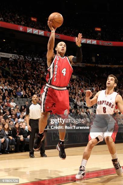 Jerryd Bayless of the Portland Trail Blazers puts up a shot over Jose Calderon of the Toronto Raptors during the game on February 24, 2010 at Air...