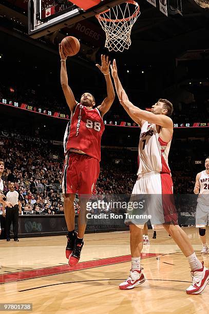 Nicolas Batum of the Portland Trail Blazers goes to the basket against Andrea Bargnani of the Toronto Raptors during the game on February 24, 2010 at...