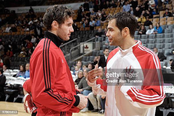 Rudy Fernandez of the Portland Trail Blazers talks with Jose Calderon of the Toronto Raptors before the game on February 24, 2010 at Air Canada...