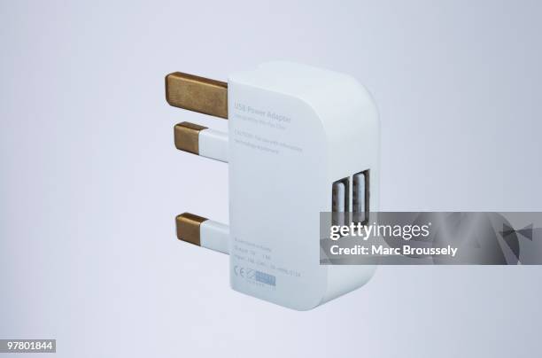 In this photo illustration a detail of a USB power adaptor, a component the UK folding plug product designed by Royal College of Art student Min-Kyu...