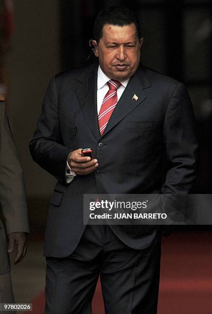 Venezuelan President Hugo Chavez at the Miraflores presidential palace in Caracas, March 17, 2010. AFP PHOTO/Juan BARRETO