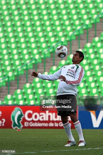 Mexico's player Patricio Araujo plays with the ball during a training session at Territorio Santos Modelo on March 16, 2010 in Torreon Coahulia,...