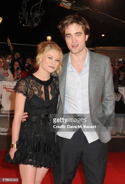 Emilie de Ravin and Robert Pattinson attend the 'Remember Me' UK film premiere at the Odeon Leicester Square on March 17, 2010 in London, England.