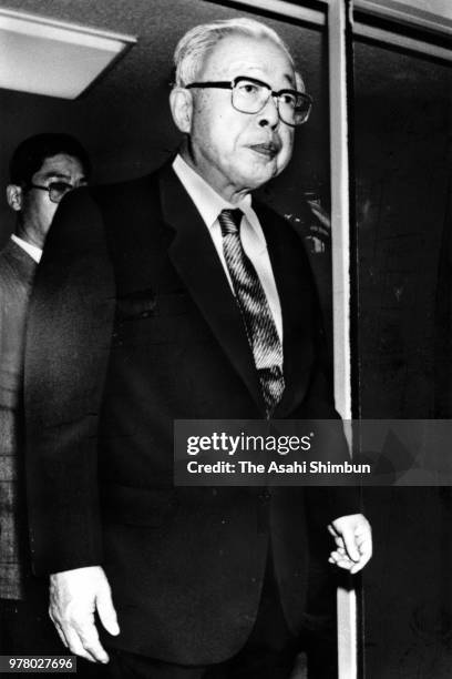 Nippon Telegraph and Telephone Chairman HIsashi Shinto leaves the company headquarters after his resignation on December 14, 1988 in Tokyo, Japan.