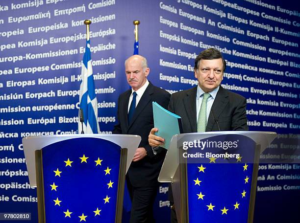 Jose Manuel Barroso, president of the European Commission, right, arrives with George Papandreou, Greece's prime minister, for a news conference at...