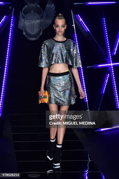 Model presents a creation by Frankie Morello fashion house during the men and women's spring/summer 2019 collection fashion show in Milan, on June...