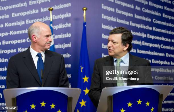 George Papandreou, Greece's prime minister, left, and Jose Manuel Barroso, president of the European Commission, hold a news conference at the...