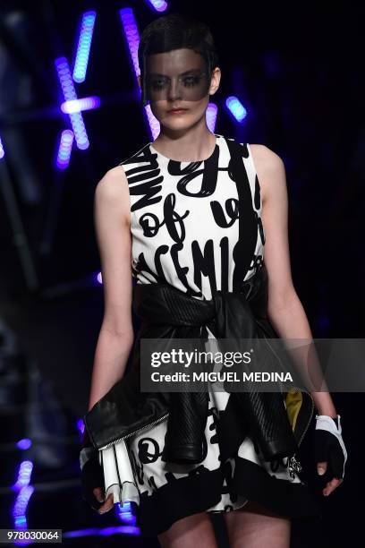 Model presents a creation by Frankie Morello fashion house during the men and women's spring/summer 2019 collection fashion show in Milan, on June...