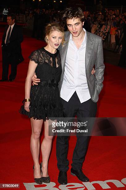 Emilie de Ravin and Robert Pattinson attends the UK Premiere of Remember Me at Odeon Leicester Square on March 17, 2010 in London, England.