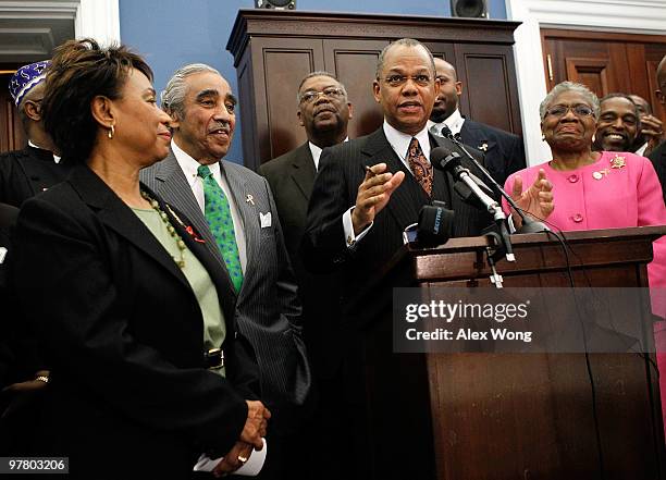 The Rev. Calvin Butts, Chairman of the Board of National Black Leadership Commission on AIDS, speaks as U.S. Rep. Charles Rangel and Rep. Barbara Lee...