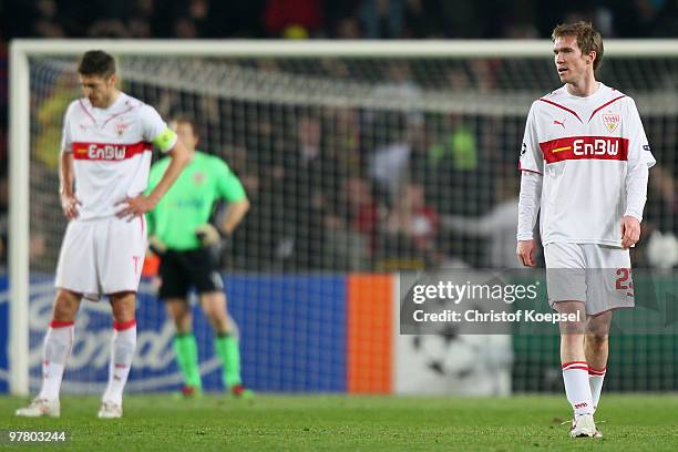 Matthieu Delpierre, Jens Lehmann and Aliaksandr Hleb of Stuttgart look dejected after the third goal of Barcelona during the UEFA Champions League...