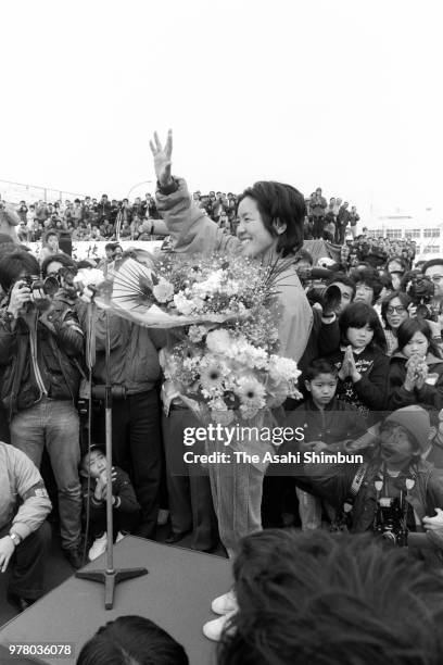 Adventurer Kyoko Imakyure celebrates after her trans-pacific sailing on December 31, 1988 in Kagoshima, Japan.