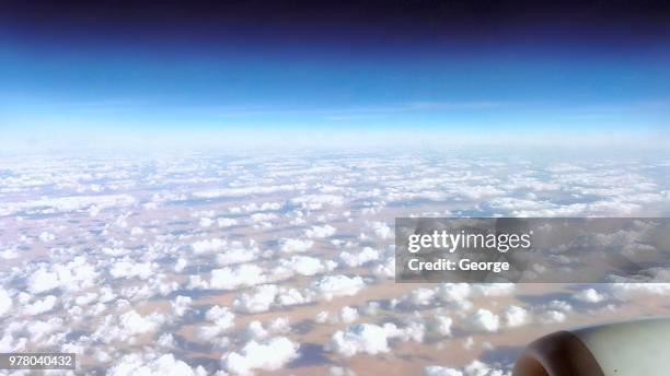 the sky over the sahara desert - sahara snow stock-fotos und bilder