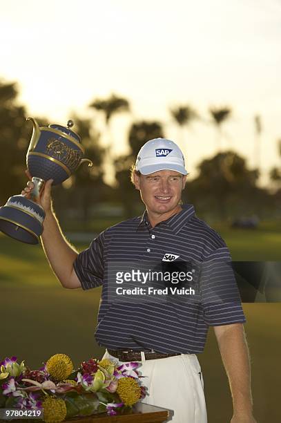 Championship: Ernie Els victorious with The Gene Sarazen Cup trophy after winning on Sunday at TPC Blue Monster Course of Doral Resort & Spa. Doral,...