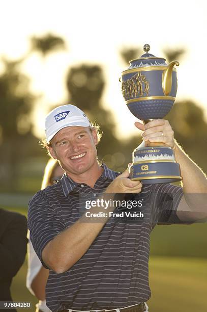 Championship: Ernie Els victorious with The Gene Sarazen Cup trophy after winning on Sunday at TPC Blue Monster Course of Doral Resort & Spa. Doral,...