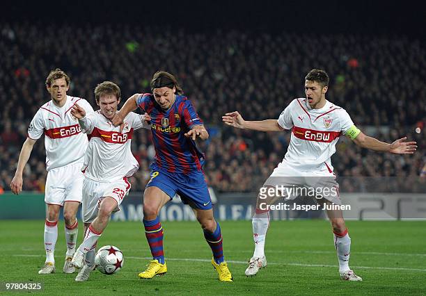 Zlatan Ibrahimovic of FC Barcelona fights for the ball with Matthieu Delpierre , Aleksandr Hleb and Georg Niedermeier of Stuttgart during the UEFA...