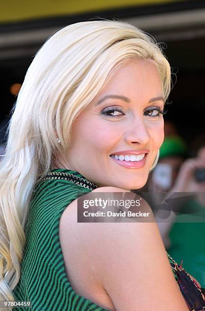 Television personality and model Holly Madison arrives for a beer pong match at the kickoff of O'Sheas' four-day block party in celebration of St....