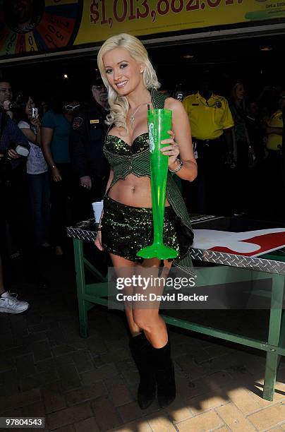 Television personality and model Holly Madison arrives for a beer pong match at the kickoff of O'Sheas' four-day block party in celebration of St....