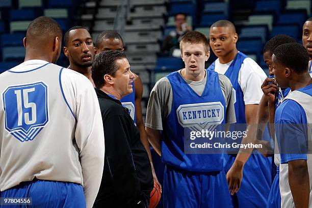 Head coach John Calipari of the Kentucky Wildcats talks with his players during practice before playing in the first round of the 2010 NCAA men�s...