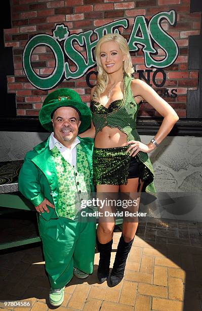 Sheas' Lucky Leprechaun, Brian Thomas and television personality and model Holly Madison, arrive for a beer pong match at the kickoff of O'Sheas'...