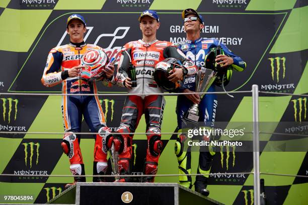 Marc Marquez of Spain and Repsol Honda Team , Jorge Lorenzo of Spain and Ducati Team , Valentino Rossi of Italy and Movistar Yamaha MotoGP during the...