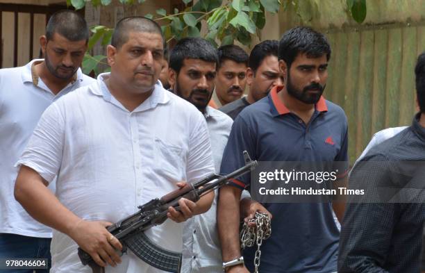 Gangster Sampat Nehra outside the court after being sent to judicial custody, at Panchkula Court on June 18, 2018 in Panchkula, India. Two weeks...