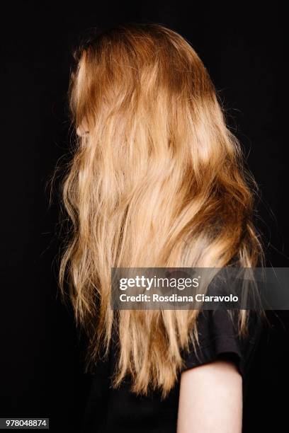 Model, hair detail is seen backstage ahead of the Isabel Benenato show during Milan Men's Fashion Week Spring/Summer 2019 on June 17, 2018 in Milan,...