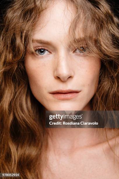 Model is seen backstage ahead of the Isabel Benenato show during Milan Men's Fashion Week Spring/Summer 2019 on June 17, 2018 in Milan, Italy.