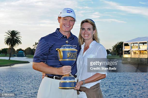 Ernie Els of South Africa hold the winner's trophy with his wife Liezl after the final round of the World Golf Championships-CA Championship at Doral...