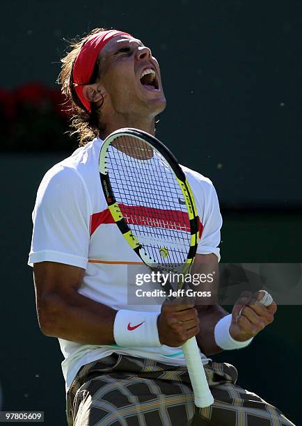 Rafael Nadal of Spain celebrates following his victory over John Isner during the BNP Paribas Open at the Indian Wells Tennis Garden on March 17,...