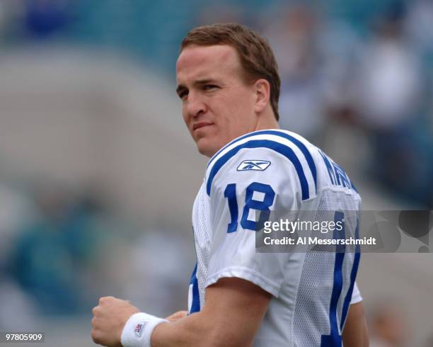 Indianapolis Colts quarterback Peyton Manning checks the field before play against the Jacksonville Jaguars December 11, 2005 in Jacksonville. The...