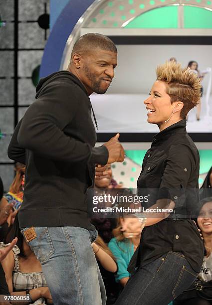 Personalities and husband and wife Terry Crews and Rebecca Crews appear on BET's "106 & Park" at BET Studios on March 17, 2010 in New York, New York.