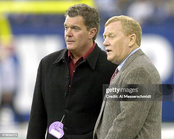 Indianapolis Colts owner James Irsay and president Bill Polian watch warmups January 4, 2004 at the RCA Dome, Indianapolis, in an AFC Wildcard game....