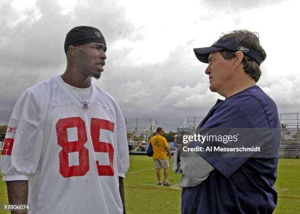 Cincinnati Bengals wide receiver Chad Johnson talks with New England Patriots coach Bill Belichick after an AFC practice Feb. 7 for the 2007 Pro Bowl...