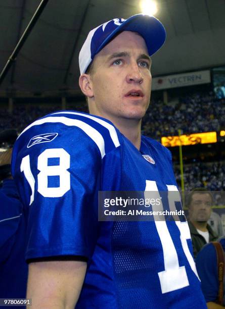 Indianapolis Colts quarterback Peyton Manning leaves the field after tossing five touchdown passes January 4, 2004 at the RCA Dome, Indianapolis, in...