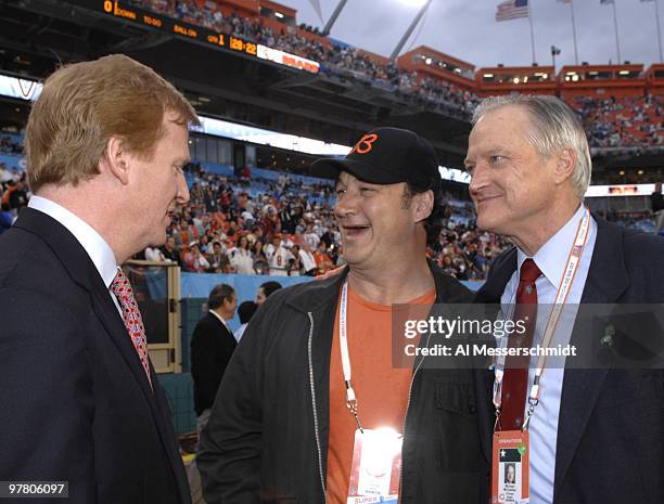 Roger Goodell, Jim Belushi and Bears chairman Mike McCaskey before Super Bowl XLI between the Indianapolis Colts and Chicago Bears at Dolphin Stadium...
